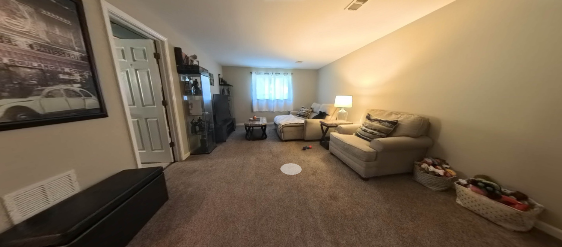 Comfortable den shown inside the sample virtual tour